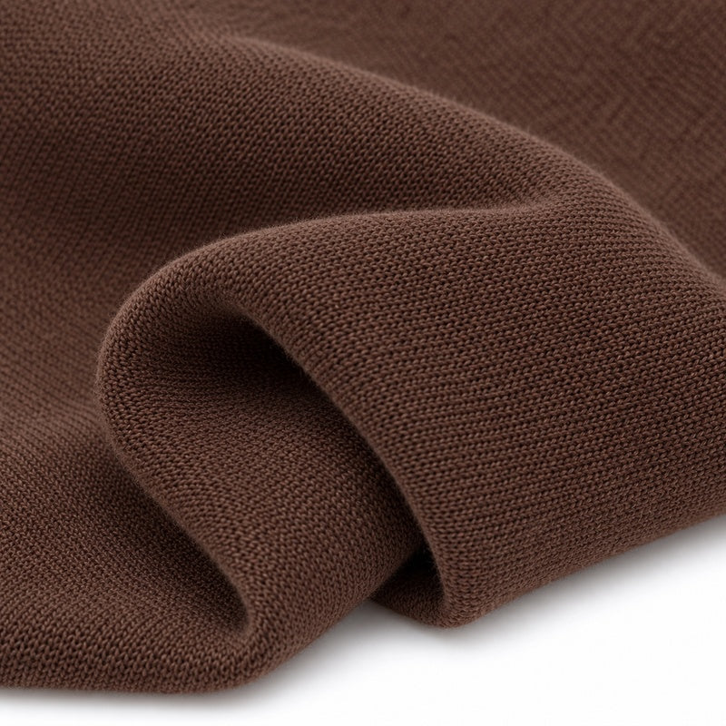 Coffee thermal knit fabric rolled texture close-up