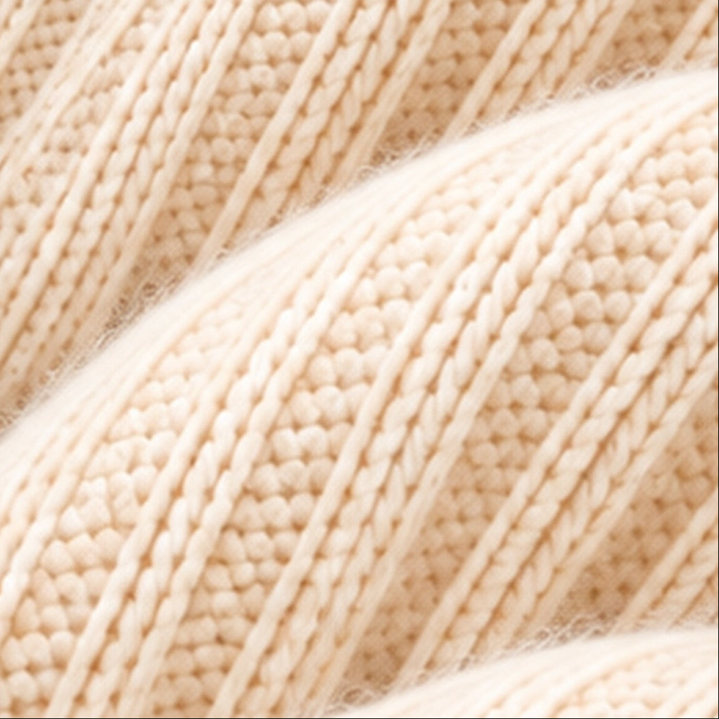 Cream roll-neck knit top and skirt co-ord fabric texture