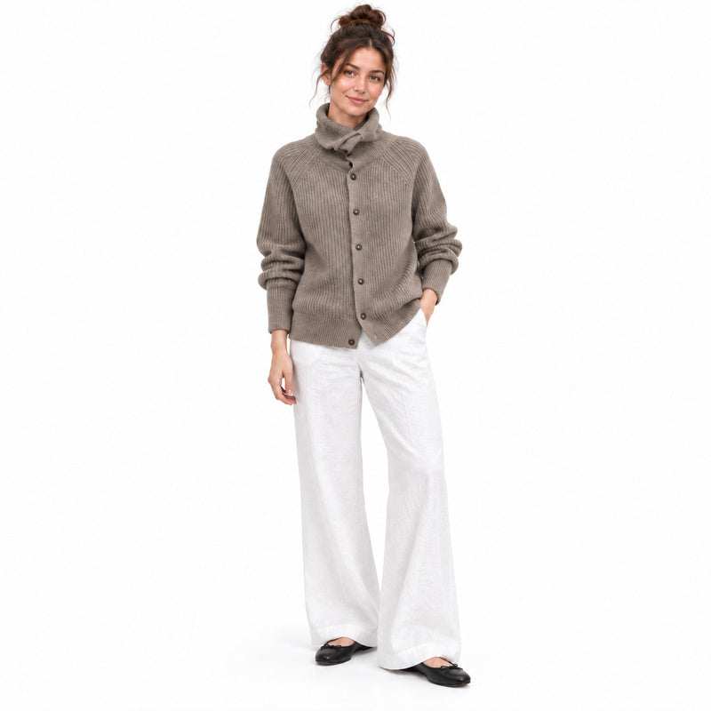 Khaki high-neck knitted cardigan with white linen trousers and black flats