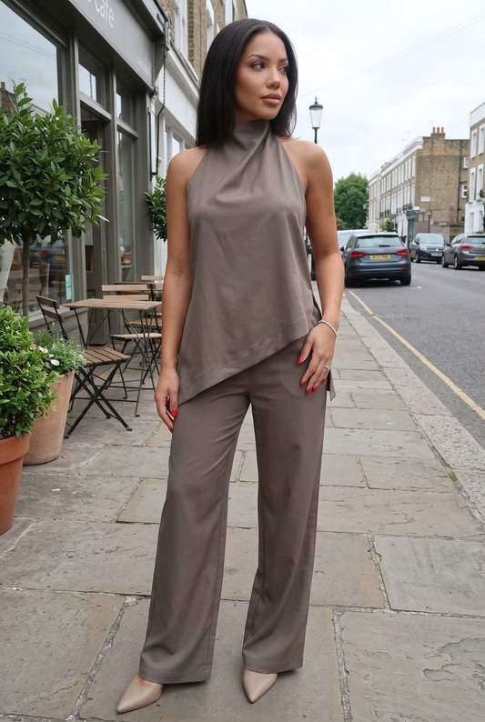 Lifelike model wearing the taupe satin outfit in a natural street setting